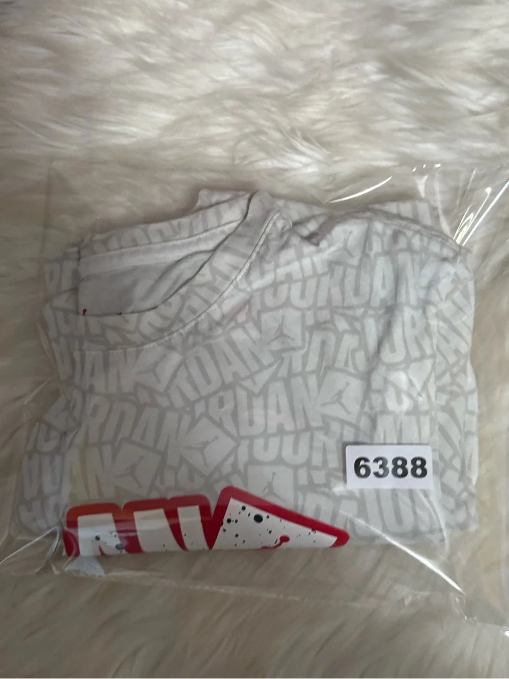 Jordan White Tee with Red Logo Graphic